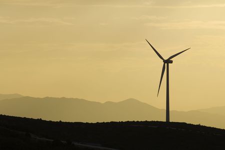 Wind power aerogenerator skyline at dusk; Fuendetodos; Spain