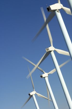 windmills group with blue sky