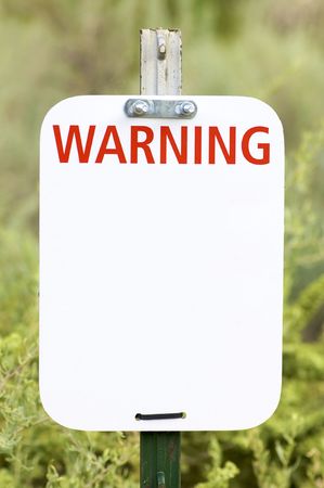 Rectangular signal in a meadowの写真素材