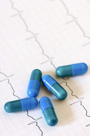 Detail of an electrocardiogram in paper and capsulesの写真素材