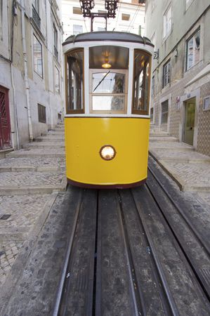 yellow tram on a street in Lisbon, Portugalのeditorial素材