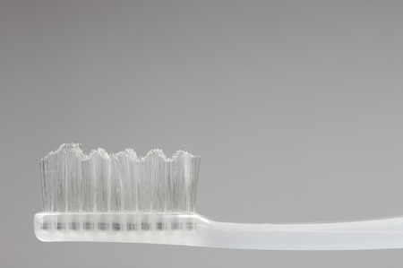 toothbrush white on white backgroundの写真素材