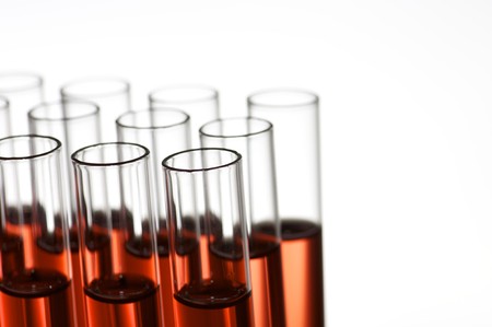 group of laboratory test tubes with red liquid insideの写真素材