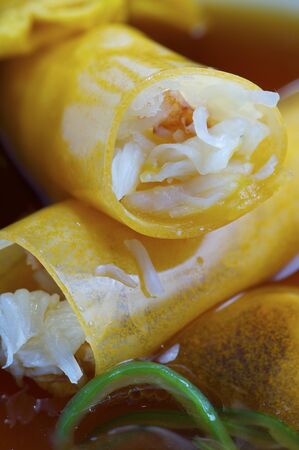 pumpkin cannelloni  with meat and vegetable soupの写真素材