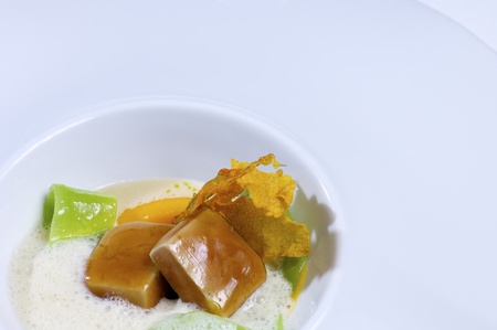caramelized dice foie with cold vegetable soupの写真素材