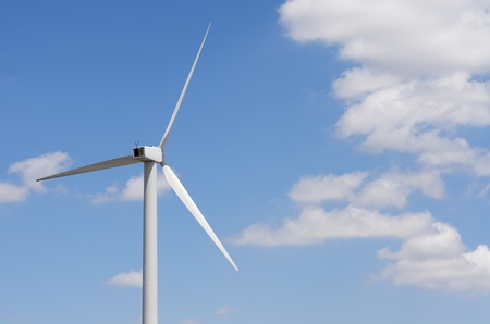 windmill energy production and sky with white clouds