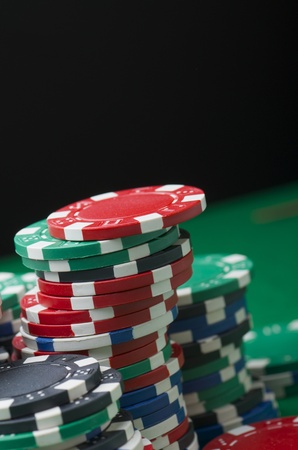 background formed for casino chips on a green feltの写真素材