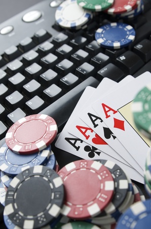 view of casino chips and cards to gamble and play onlineの写真素材
