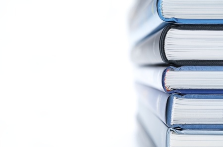 forefront of a group of books stacked