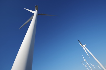 bottom view of a group of windmills  power productionの写真素材