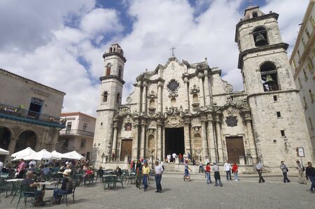 Havana, Cuba  - January 29, 2007: street scene in the cathedral square, stands the Cathedral of San Cristobal. This is a typical place frequented by visiting tourists.のeditorial素材