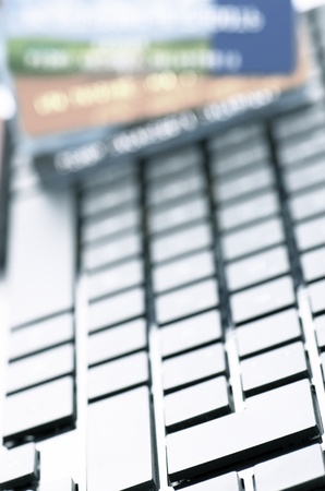 credit cards and a computer for online shoppingの写真素材