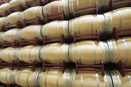 stacked wine barrels to ferment the wine, La Rioja, Spain