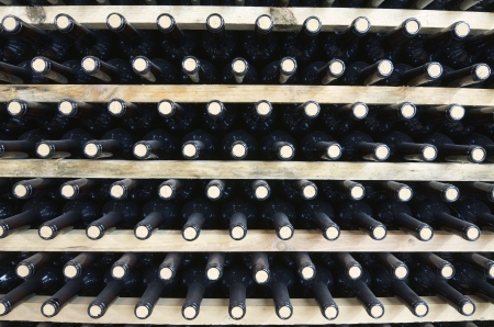 stacked wine bottles to ferment the wine, La Rioja, Spain