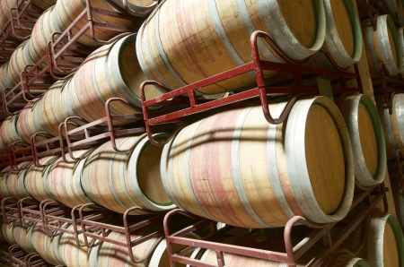 stacked wine barrels to ferment the wine, La Rioja, Spain