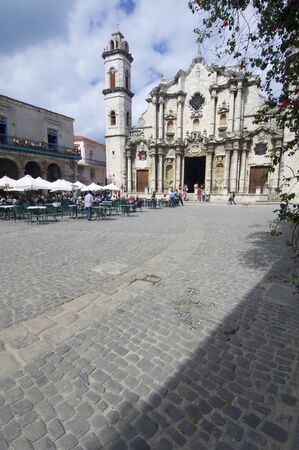 Havana, Cuba  - January 29, 2007: tourists visit cathedral square, stands the Cathedral of San Cristobal. This is a typical place frequented by visiting tourists.のeditorial素材