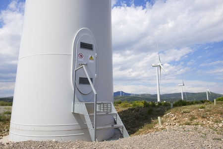 Entrance to a windmill for renewable electric energy production