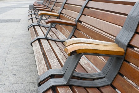 wooden bench in the Plaza de Colon, Madrid, Spain.の写真素材