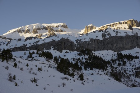 Winter sunset in the Pyrenees, Bisaurin Peak, Aragues Valley, Aragon, Huesca, Spain.の写真素材