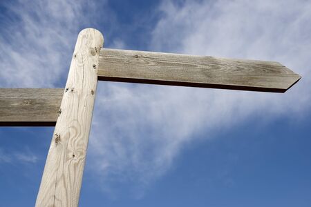 View of two directional wood signalsの写真素材