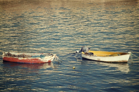 Small wooden boats at the beach of La Caleta, Cadiz, Andalucia, Spainの写真素材