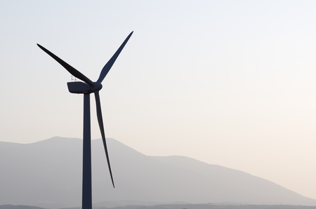 silhouette of a group of windmills for renewable electric energy production, Fuendejalon, Zaragoza,...