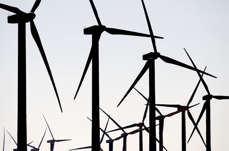 Windmills for renowable electric production with white sky, Zaragoza province, Aragon, Spainの写真素材