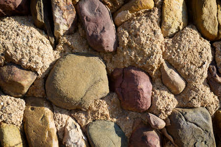 Background created with stone wall of a rural building