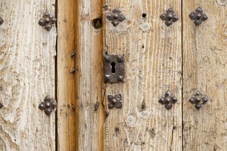 Closeup of an old wooden door in Cuenca, Castilla La Mancha, Spain.の写真素材