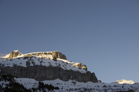 Winter sunset in the Pyrenees, Aragues Valley, Aragon, Huesca, Spain.の写真素材