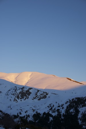 Winter sunset in the Pyrenees, Aragues Valley, Aragon, Huesca, Spain.