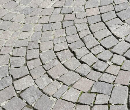 Floor of a street with stone tiles.