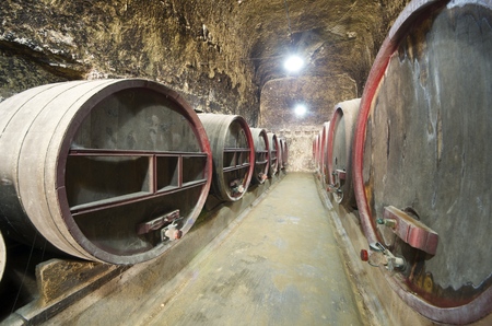 stacked wine barrels in Breze Castle, Loire Valley, France. Built between the 11th and 19th centuries, it houses an extraordinary subterranean complex, a castle in a castle. It is owned by the family Colbert, and since 2000 is open to the public.のeditorial素材