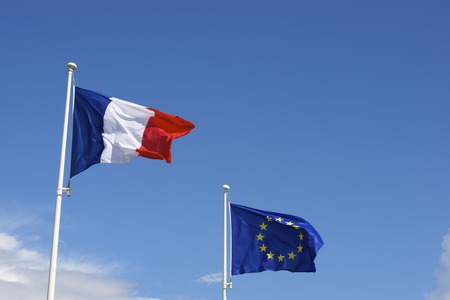 Close-up of the flags of the European Union and France.の写真素材