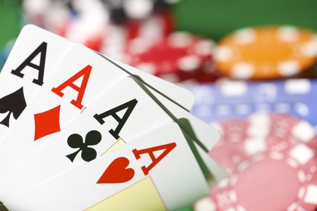 view of a gaming table with green mat