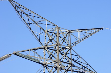 high voltage pylon with blue skyの写真素材