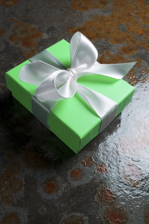 Luxury box tied with a white ribbon.の写真素材