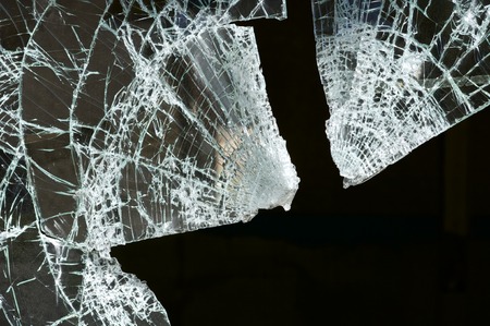 Close-up of broken windowpanes.