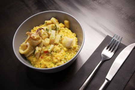Close-up of a plate of risotto with seafood.の写真素材