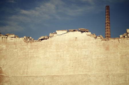 Brick smokestack in an old abandoned factory, Spain.の写真素材