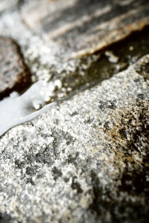 Floor of a street with stone tiles, Paris, France.の写真素材