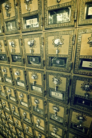 Mailboxes lined up in a post office.の写真素材