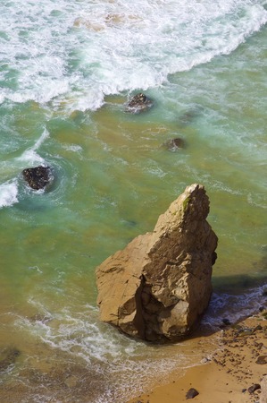 Wave and stone in Cabo da Roca, Areia, geographical point of western Europe, Portugal.の写真素材