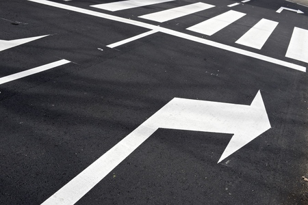 Traffic signs painted on the road.の写真素材