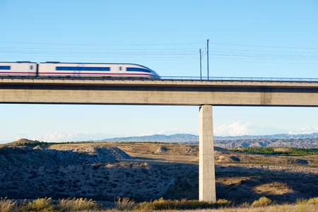 view of a high-speed train crossing a viaduct in Roden, Zaragoza, Aragon, Spain. AVE Madrid Barcelona.の写真素材