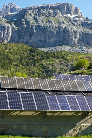 Photovoltaic panels on the roof of a hut in the Pyrenees, Aragues Valley, Aragon, Huesca, Spain.