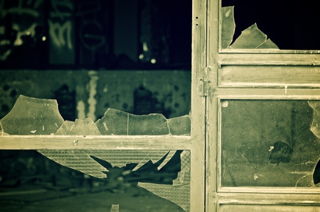 Close-up of broken windowpanes.の写真素材