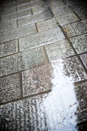 Floor of a street with stone tiles.の写真素材