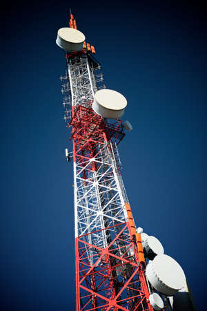 Telecommunications tower with clear blue sky.の写真素材