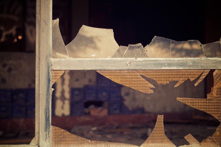 Close-up of broken windowpanes.の写真素材
